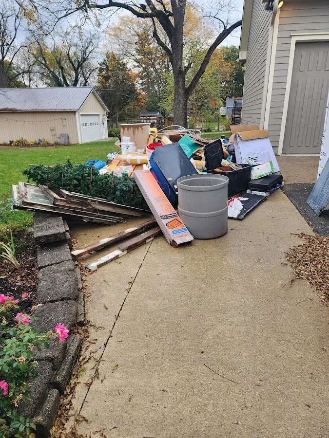 Dumpster being loaded with debris for Residential Dumpster Rental in Halifax